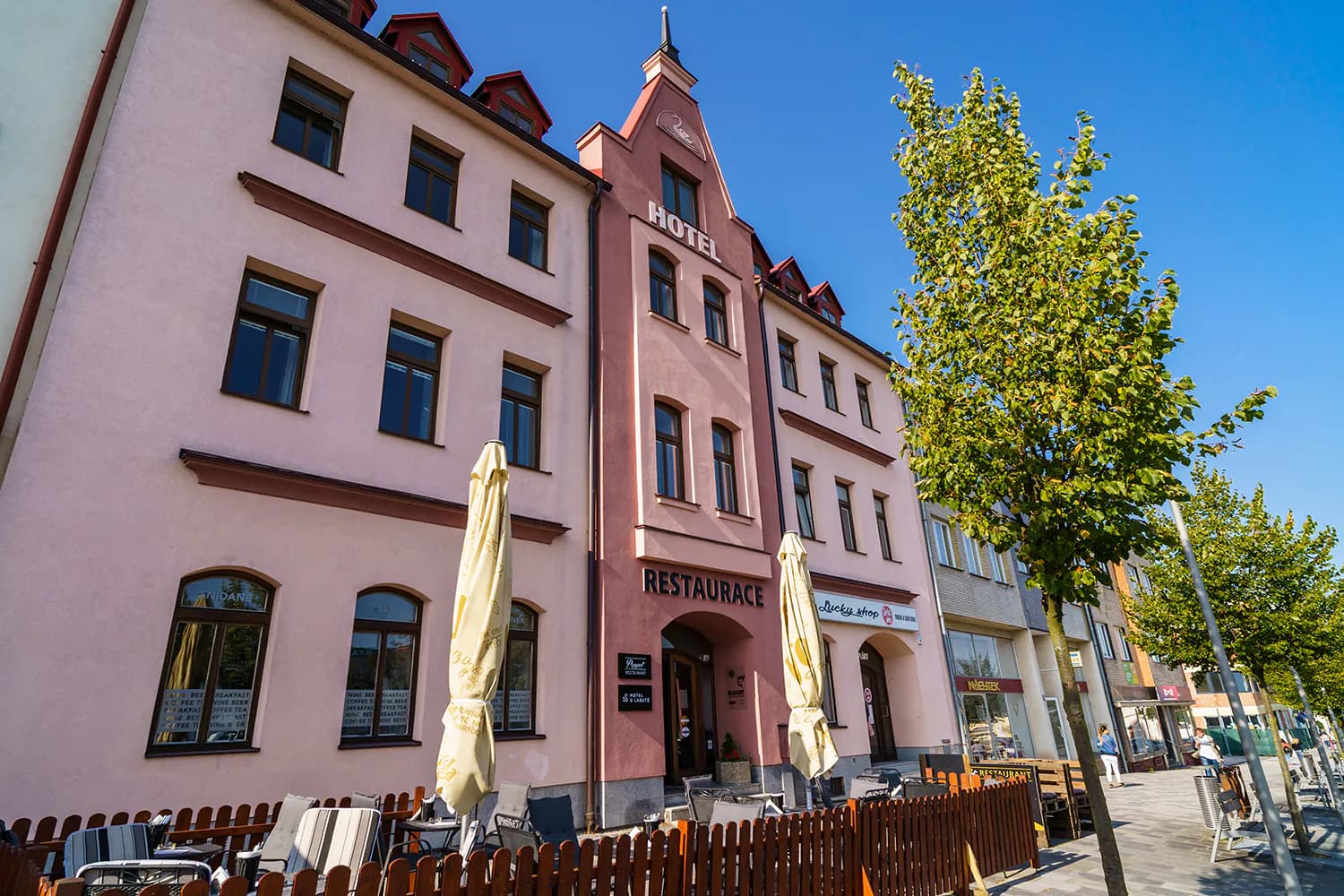 Hotel U Labutě — the historic building and its terrace