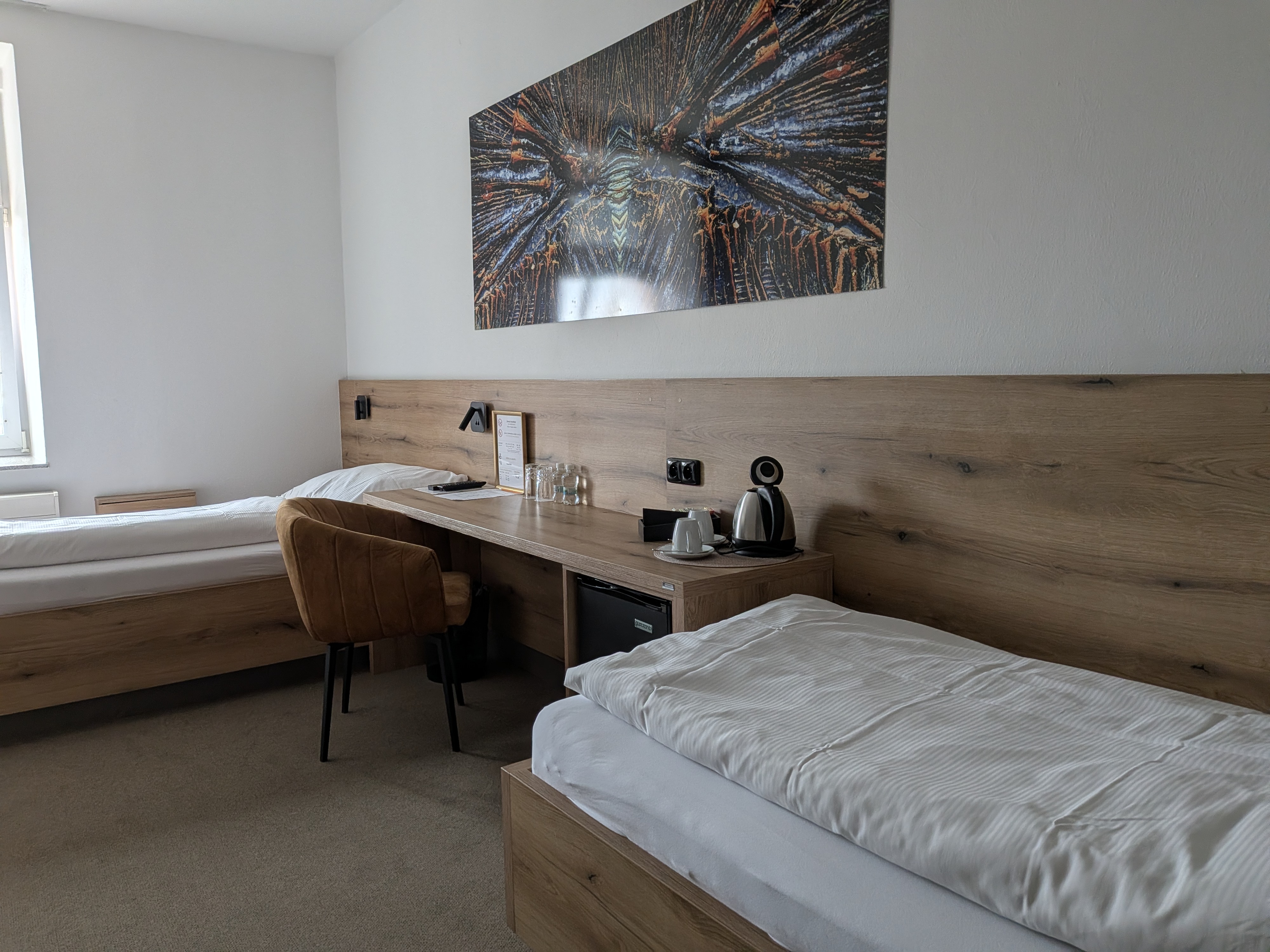 A guest room at Hotel U Labutě